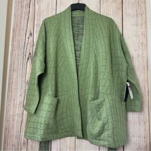 Nike Womens Yoga Therma Fit Jacquard Reversible Oversized
Kimono Top Large